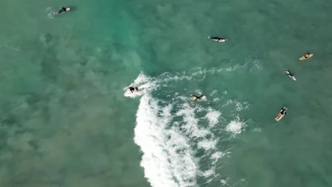 Surfers Catching Waves Breaking Over White Sand Cable Beach Broome WA Stock Footage 276427885