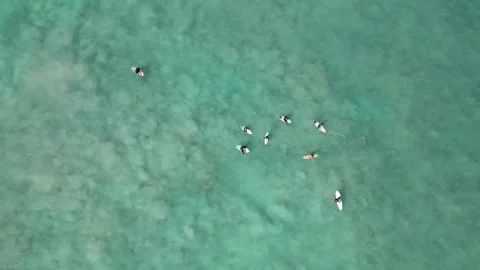 Surfers Catching Waves Breaking Over White Sand Cable Beach Broome WA Stock Footage 276427902