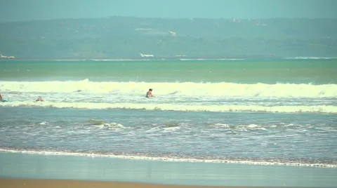 Surfers Catching Waves Stock Footage 50448563