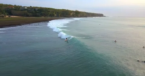 Surfers catching the waves Stock Footage 96006434