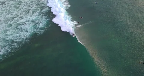 Surfers catching the waves Stock Footage 96006664