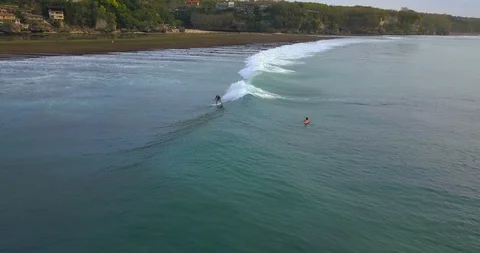 Surfers catching the waves Stock Footage 96006765