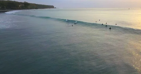 Surfers catching the waves Stock Footage 96007052