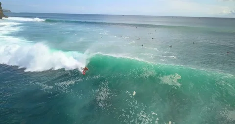 Surfers catching the waves Stock Footage 96042898