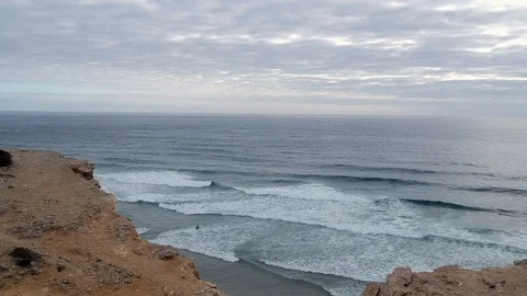Surfers in the coast of Portugal. Aerial views Stock Footage