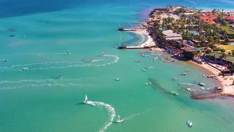 Surfers doing windsurfing at Turkey's world famous Cesme Alacati Beach Stock Footage 240853587
