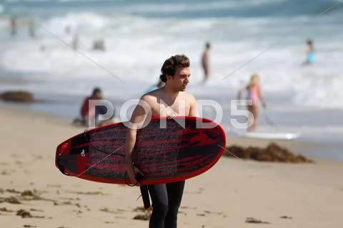 Surfers at el porto beach, ca Stock Photos