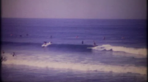 Surfers enjoy the California waves 1950s vintage film home movie 2633 Stock Footage