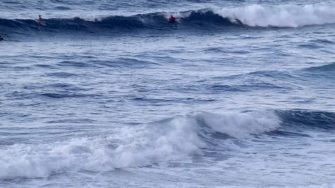 Surfers enjoying waves Stock Footage