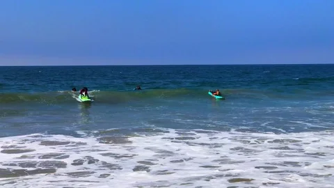 Surfers find Wave3 Stock Footage 95768983