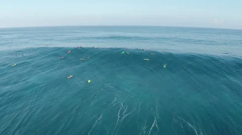 Surfers floating in Pacific ocean Stock Footage 50179389