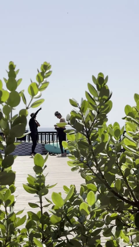 Surfers getting ready at Ribeira D Ilhas beach Ericeira Stock Footage 304883151