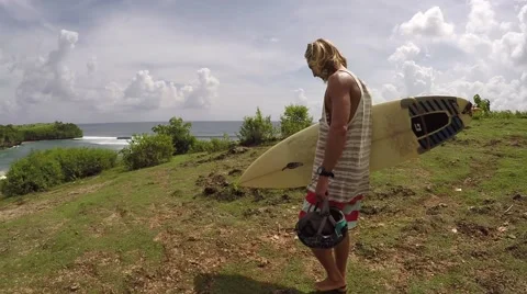 Surfers go to the Beach Stock Footage 67528362