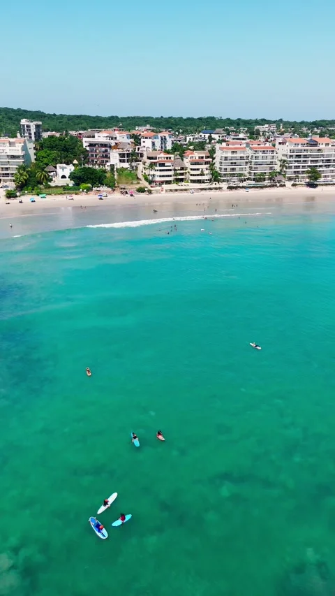 Surfers at the Hotel Zone Beach in Punta Mita, Nayarit. Mexico Stock Footage 295799200