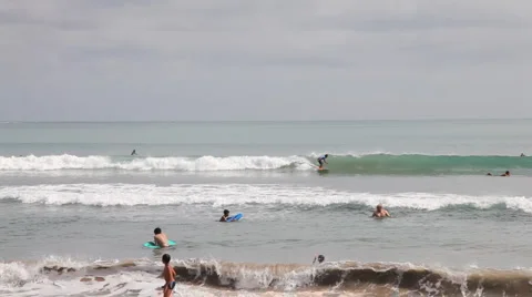 Surfers on the Kuta beach  스톡 동영상 1102306