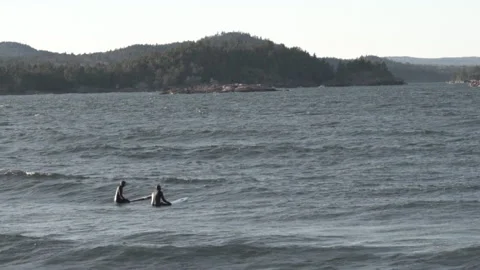 Surfers on Lake Superior Stock Footage 145146466