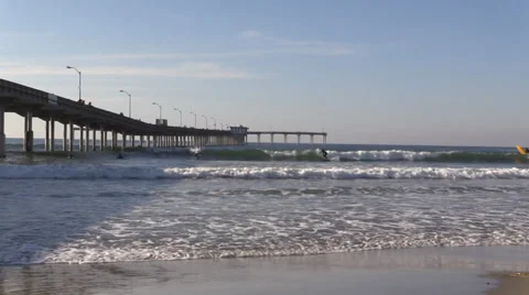 Surfers Next To Ocean Beach Pier 07 Stock Footage 32790656