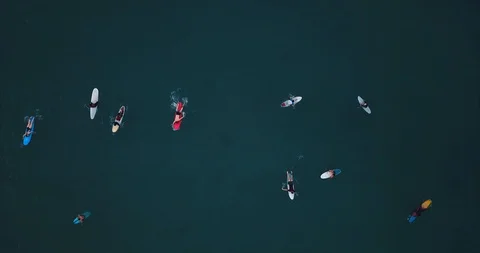 Surfers Paddling For Catching Waves During Surfing In The Indian Ocean,4k Stock-Footage 130083008