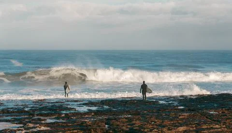 Surfers Stock Photos