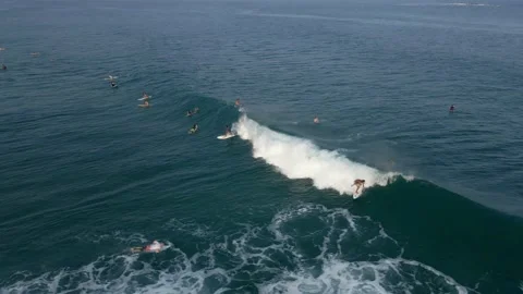 Surfers riding a big wave, some fall into the water Stock Footage 155082075