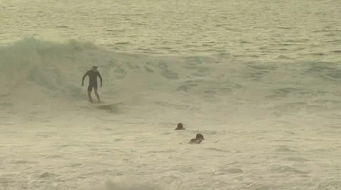 Surfers Riding A Wave Video stock 19146665