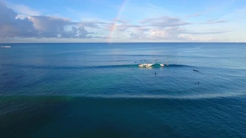 Surfers riding waves Rainbow Video stock 89635563