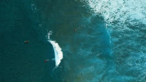 Surfers Riding Waves in Turquoise Ocean at Playa Encuentro, Dominican Republic Video stock 314060189