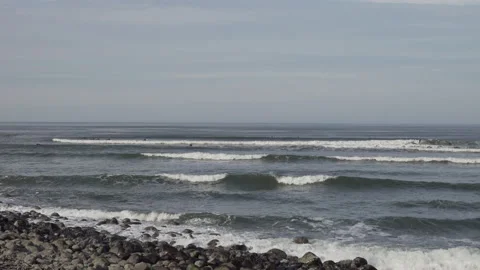 Surfers Seaside dual peeling wave Stock Footage 201446522