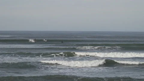 Surfers Seaside long ride Stock Footage 201446518