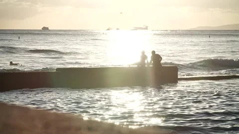 Surfers at sunset 113 Stock Footage 155495267