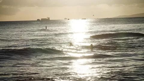 Surfers at sunset 114 Stock Footage 155495259
