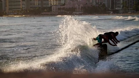 Surfers at sunset 115 Stock Footage 155495266