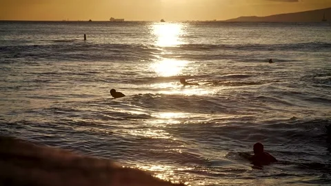 Surfers at sunset 116 Stock Footage 155495264