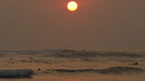 Surfers Sunset 4k Stock Footage 44387031