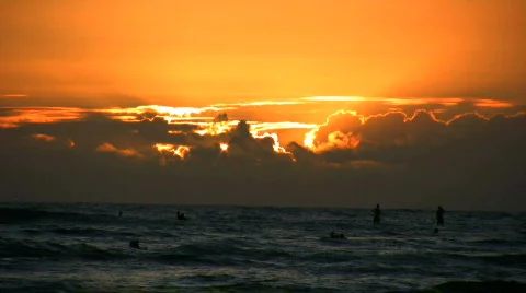 Surfers at Sunset  Stock Footage 659314