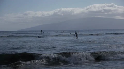 Surfers Surfing in the Ocean Stock Footage 46559999