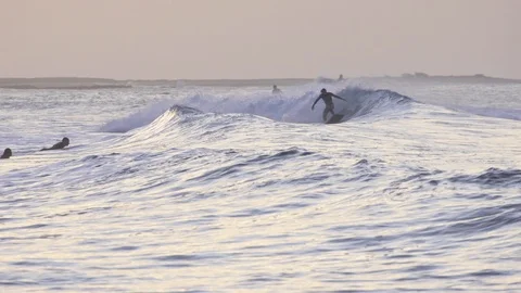 Surfers surfing on the ocean waves Video stock 86171583