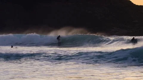 Surfers surfing on speedy waves Stock Footage 71543874