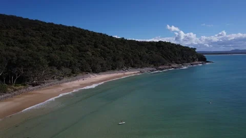 Surfers Surfing At Tea Tree Bay Beach In Summer In Noosa National Park, QLD Stock Footage 316800267