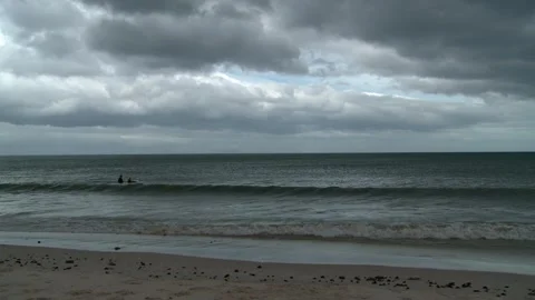 Surfers waiting for a wave Stock Footage 310537392