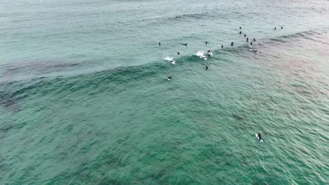 Surfers Waiting for Waves in the Open Ocean Vídeos de archivo 326979875