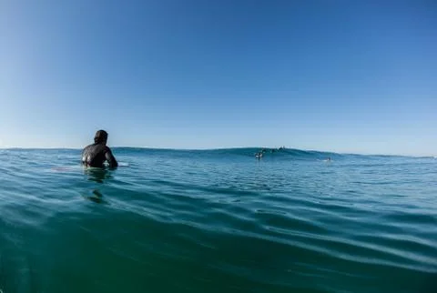 Surfers Waiting Waves Stock Photos