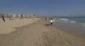 Surfers walking on the beach with the surfboards, Porto 4k or 4k+ Resolution