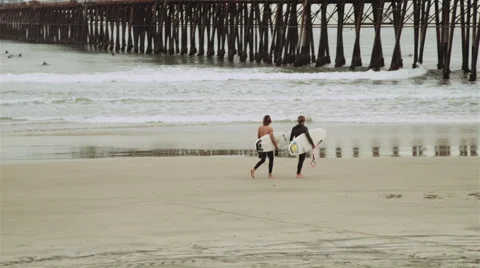 Surfers Walking Stock Footage 46879148