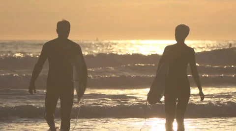 Surfers walking into Sunset 02 스톡 동영상 31745636