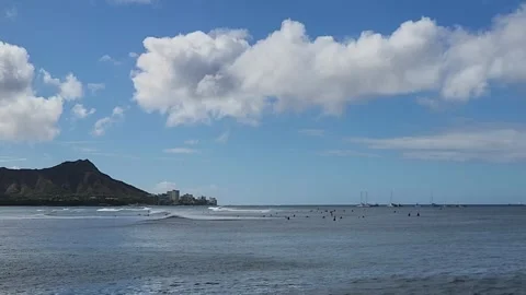 Surfers in the water off of Ala Moana Beach on August 2, 2026 Stock Footage 341387053