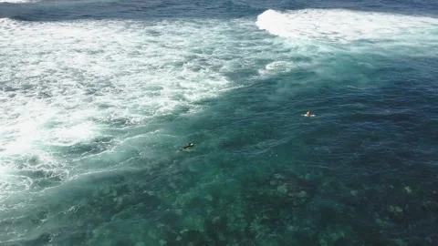 Surfers on the waves of the Canary Islands Stock Footage 300554697