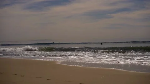 Surfers in the waves Stock Footage 234067190
