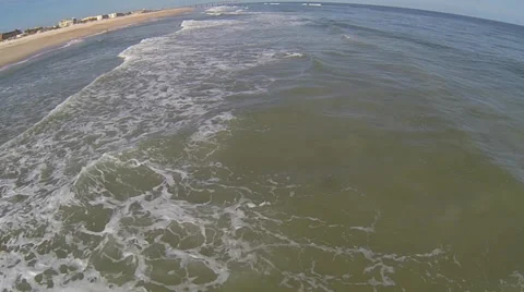 Surfing action in St. Augustine FL Aerial Stock Footage 34542572