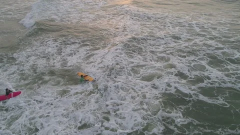 SURFING ATTEMPT ON INDIAN OCEAN Stock Footage 133567386